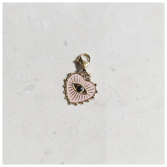 Breloque cœur rose œil