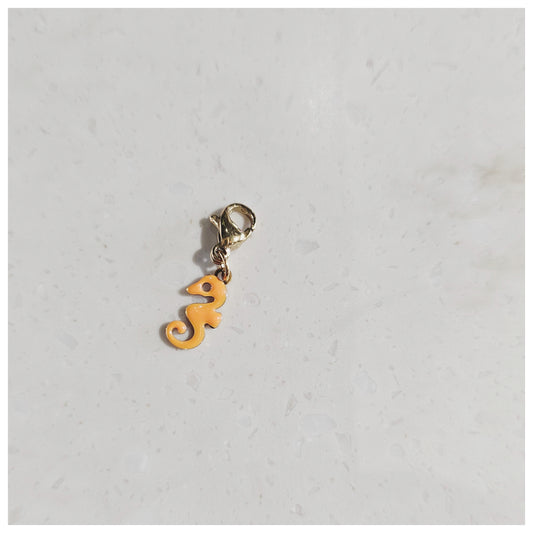 Breloque hippocampe jaune